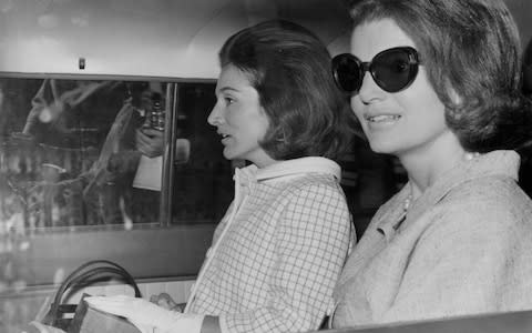 Lee Radziwill and Jacqueline Kennedy, sitting in the back of a car in London, May 15th 1965 - Credit: Hutton