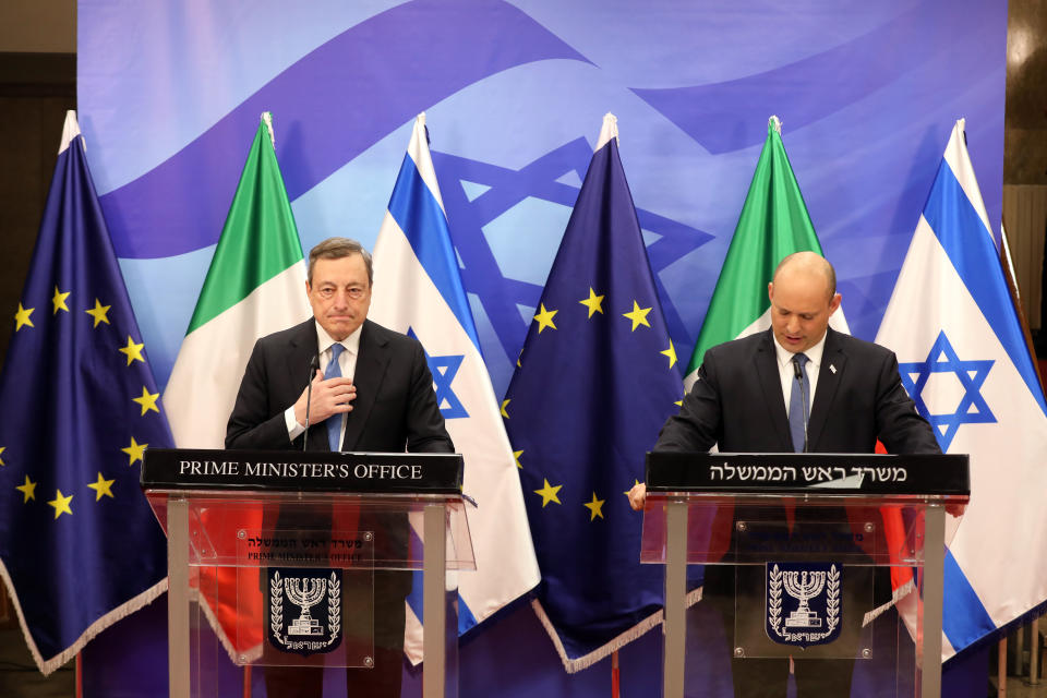 Italian Prime Minister Mario Draghi, left, and Israeli Prime Minister Naftali Bennett make a press statement at the prime minster's office in Jerusalem, Israel, Tuesday, June 14, 2022. Draghi is on two-day official visit to Israel and the Palestinian authority. (Abir Sultan/Pool via AP)