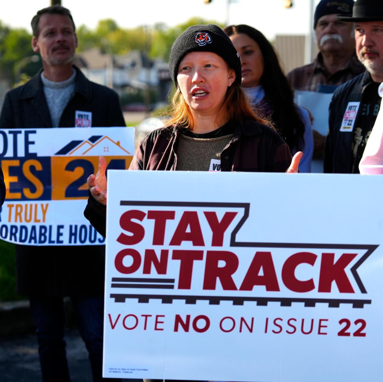 Abby Friend, one of the founders of ‘Derail the Sale’, speaks at a press conference hosted by the Cincinnati NAACP at the Board of Elections in Norwood to urge voters to vote no on Issue 22, Wednesday, Oct. 11, 2023. Issue 22 is asking voters to allow the city of Cincinnati to sell the Cincinnati Southern Railway they have owned since the 1880’s. In urging voters to vote no, Friend said the city needs to grow a spine and get a deal that’s good for future generations. She said, they (the city) is telling us one thing and doing the other.