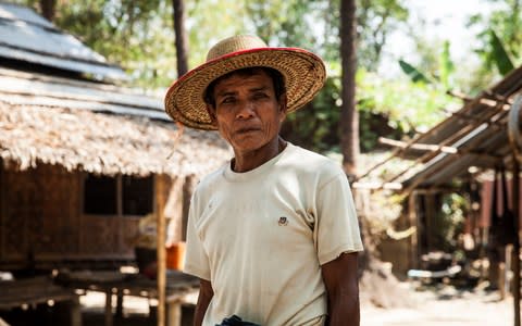 Thein Win, a farmer from the Ayeyerwady region, reported that 12 acres of his land was seized in the 1990s - Credit: Patrick Brown/Human Rights Watch