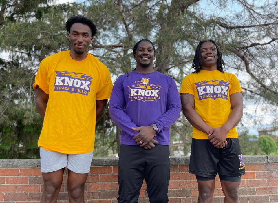 Knox College's Tyrell Pierce, left, and Derrick Jackson, right, will compete in the NCAA Division III outdoor track and field championships this weekend at the SPIRE Institute in Geneva, Ohio. Prairie Fire coach Evander Wells, center, will accompany the pair, and he's played a big part in their success.