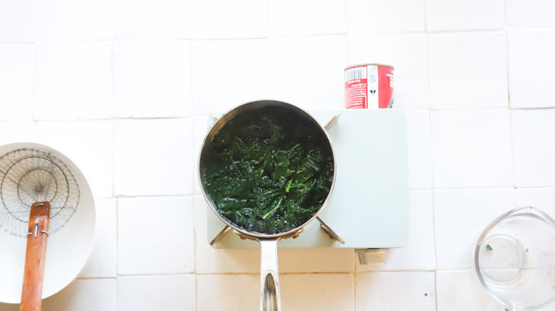 Kale simmering in hot water