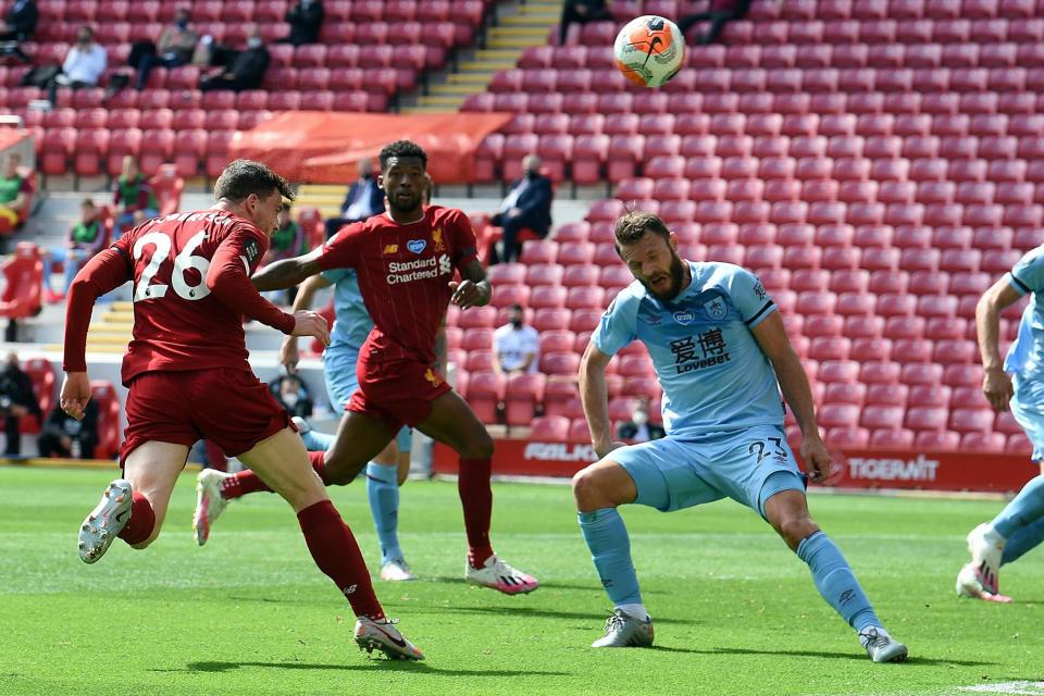 Andy Robertson's superb header was not enough to give Liverpool all three points against Burnley at Anfield (Liverpool FC via Getty Images)