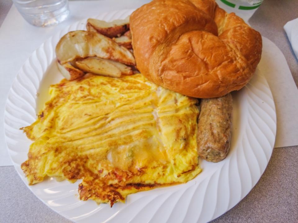 eggs and sausage on plate amtrak