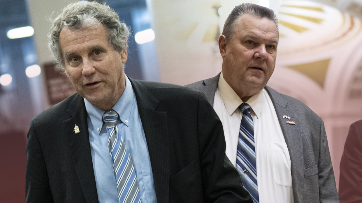 Ohio Sen. Sherrod Brown, left, and Sen. Jon Tester of Montana