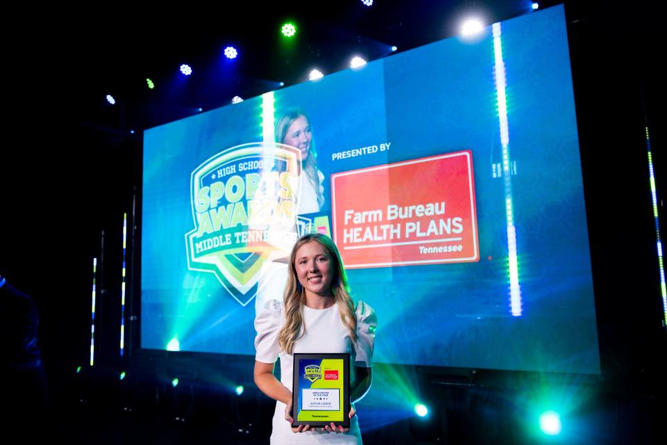 Sophie Linder revives her award for Girls Golfer of the Year during the Middle Tennessee High School Sports Awards, presented by Farm Bureau Health Plans at Marathon Music Works, on Wednesday, June 8, 2022, in Nashville, Tenn. 