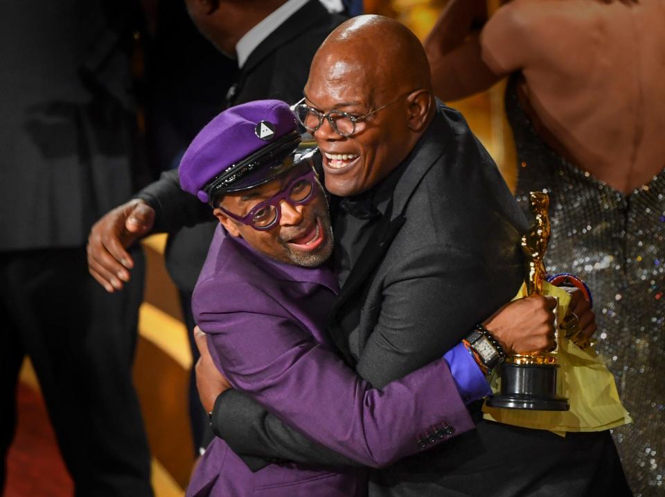 Spike Lee celebrates with Samuel L. Jackson as Lee accepts the award for best adapted screenplay for "BlacKkKlansman" during the 91st Academy Awards at the Dolby Theatre in Los Angeles on Feb. 24, 2019.