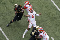 Clemson quarterback DJ Uiagalelei (5) looks to pass against Wake Forest during the first half of an NCAA college football game in Winston-Salem, N.C., Saturday, Sept. 24, 2022. (AP Photo/Chuck Burton)