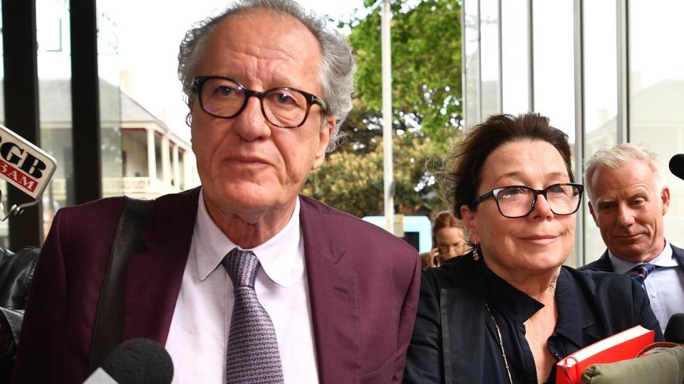 Geoffrey Rush and his wife Jane Menelaus leave the Federal Court