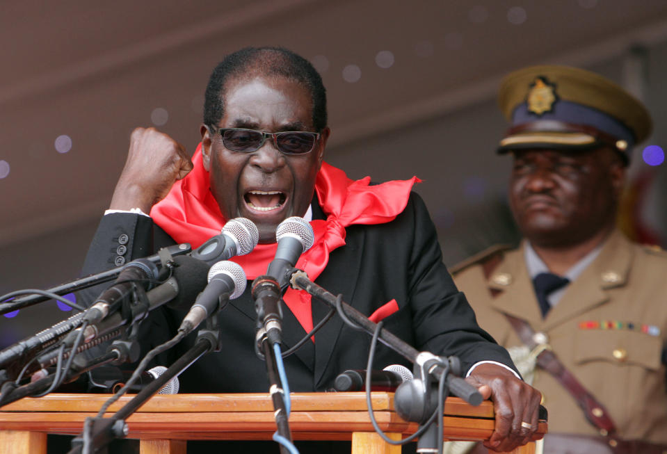 Zimbabwe's President Robert Mugabe delivers his speech during celebrations to mark his 90th birthday in Marondera about 100 kilometres east of Harare, Sunday, Feb. 23, 2014. Mugabe who is Africa's oldest leader has been in power in the Southern African nation since 1980. (AP (AP Photo/Tsvangirayi Mukwazhi)