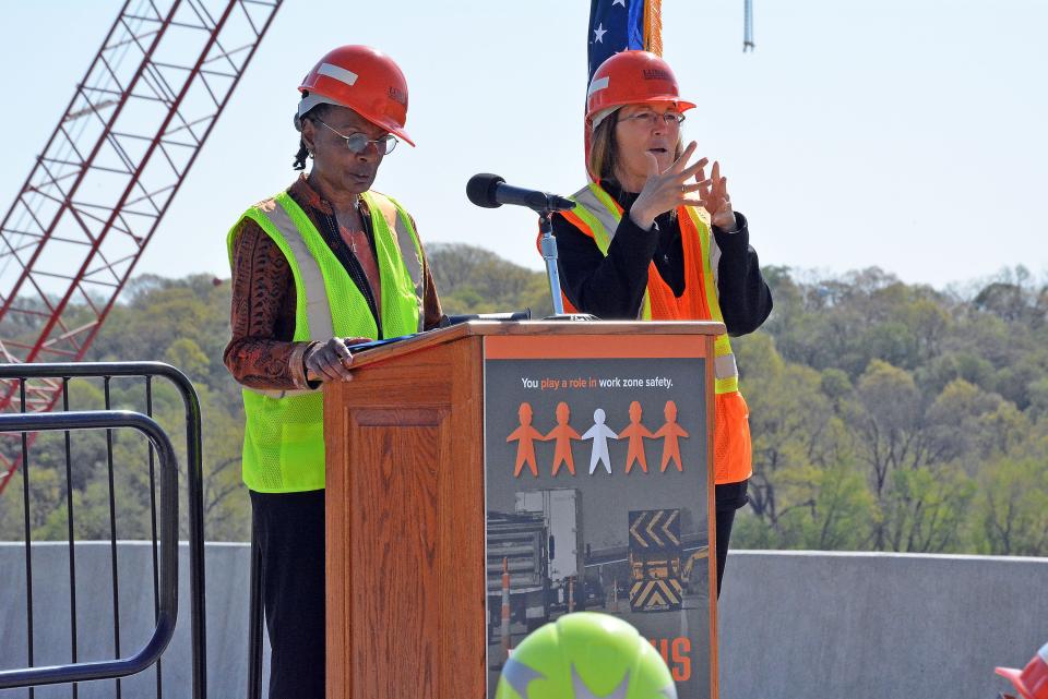 Federal Highway Administration Executive Director Gloria Shepherd delivers remarks Tuesday as part of the kickoff of National Work Zone Awarness week from the Lance Cpl. Leon Deraps Missouri River Bridge at Rocheport. Her statement is interpreted into American Sign Language by Kathleen Alexander.