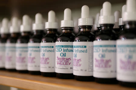 FILE PHOTO: CBD Infused Oil inventory made from hemp is seen stacked in a cupboard at Sisters of the Valley near Merced, California, U.S., April 18, 2017. REUTERS/Lucy Nicholson