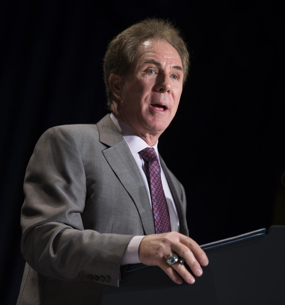 FILE - In this Feb. 2, 2015, file photo, former NASCAR race car driver Darrell Waltrip delivers the keynote address during the National Prayer Breakfast in Washington. Waltrip will soon Boogity! Boogity! Boogity! his way into retirement. Everyone yearns for an opportunity to say farewell on their own terms, so with that, Waltrip should bring his second career as a NASCAR broadcaster to a close and squeeze out his classic catchphrase on his own terms as Fox Sports closes its portion of the broadcast deal. (AP Photo/Evan Vucci, FIle)