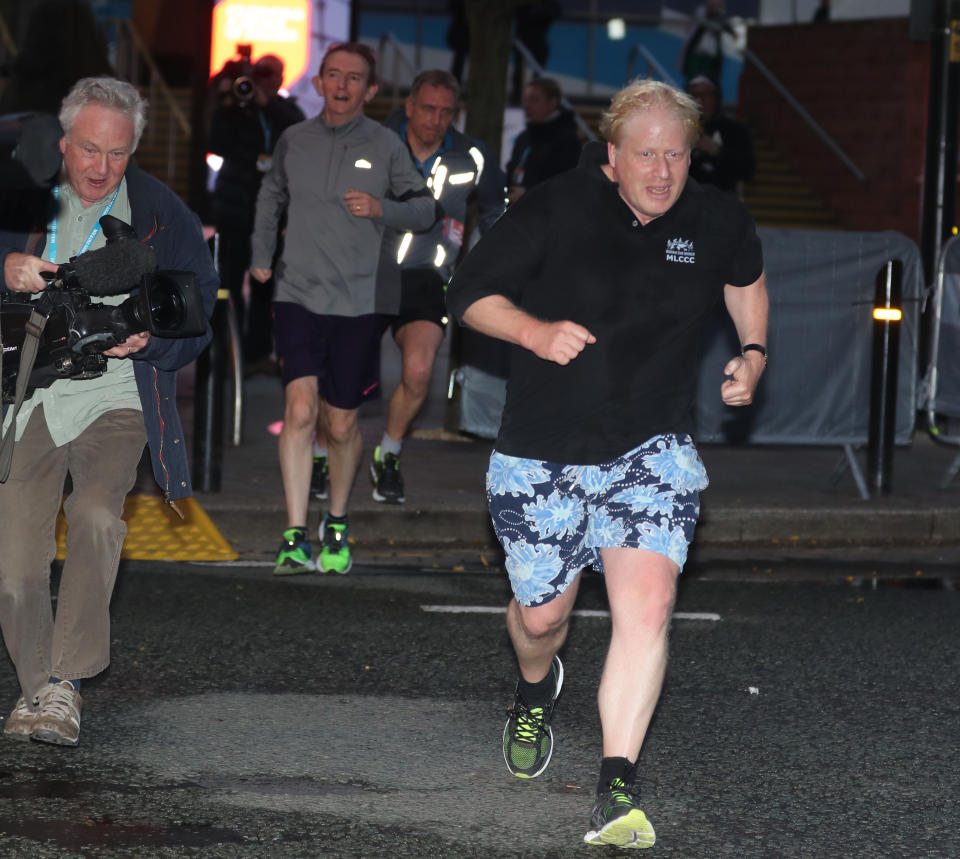 Foreign Secretary Boris Johnson goes for an early morning run during the Conservative Party Conference in Manchester.