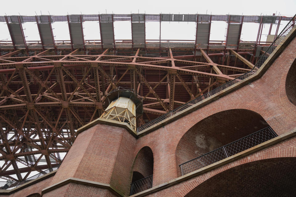 A suicide deterrent net under construction on the Golden Gate Bridge is seen above Fort Point in San Francisco, Thursday, Dec. 7, 2023. The barrier at the bridge is near completion more than a decade after officials approved it. (AP Photo/Eric Risberg)