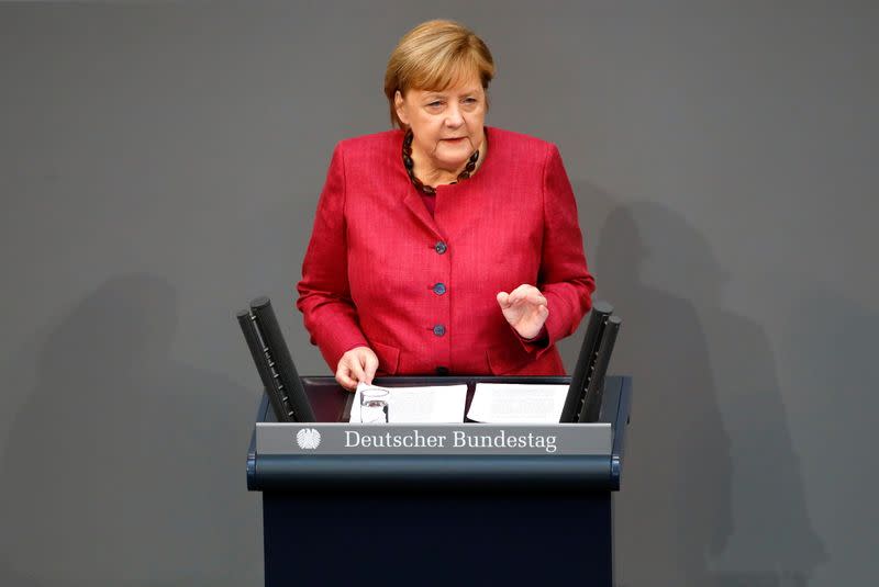 German Chancellor Angela Merkel attends a session of the Bundestag, in Berlin