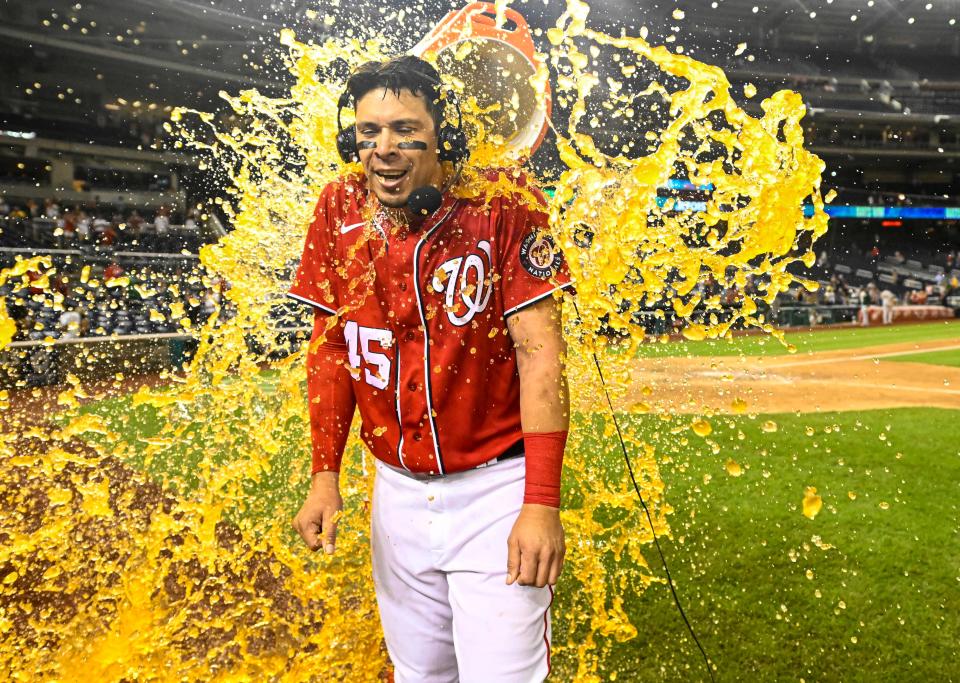 Joey Meneses gets a Gatorade bath after a walk-off homer against Oakland on Sept. 1.