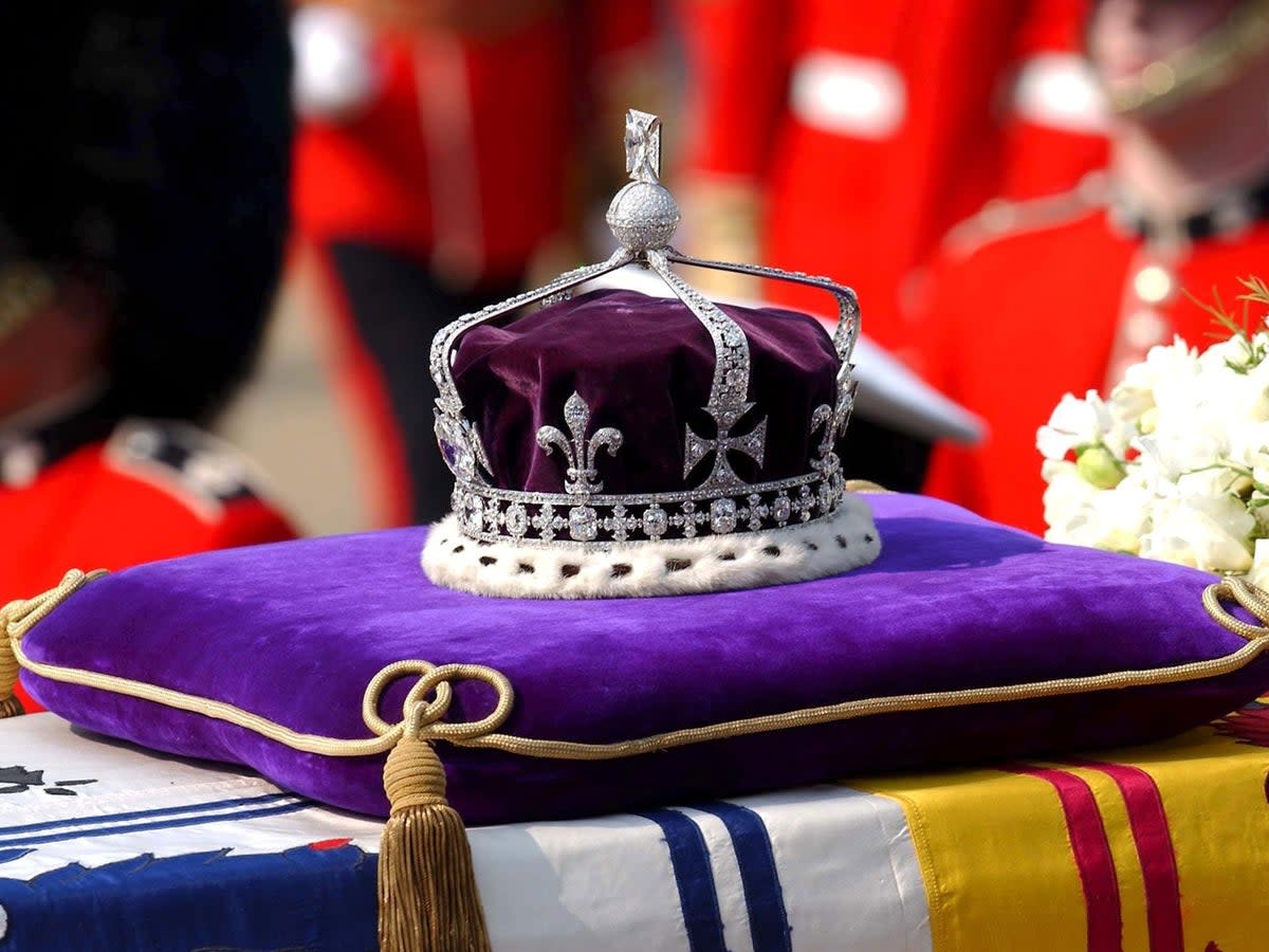The Queen Mother's crown on her coffin during a ceremonial procession on 5 April 2002. The Koh-i-Noor diamond is the centre-piece of the crown, which will one day be worn by the Duchess of Cornwall  (Rex Features)