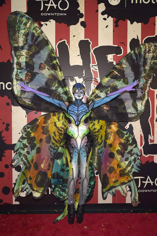 <p>No.1: In 2014, Klum really spread her wings, morphing into an amazing butterfly. But not just any butterfly — one with prosthetics, body makeup, and the most enormous colorful wings, which took five hours to get on. The result was simply stunning, despite the fact that she couldn’t see very well. It’s our all-time favorite for execution (the sheer work that went into it), but she should also get props for spending all night in a club wearing the getup. Do you know how many people must have knocked her wings? It will be very hard to top this in 2017, but we know she’ll keep trying. (Photo: Gary Gershoff/WireImage) </p>