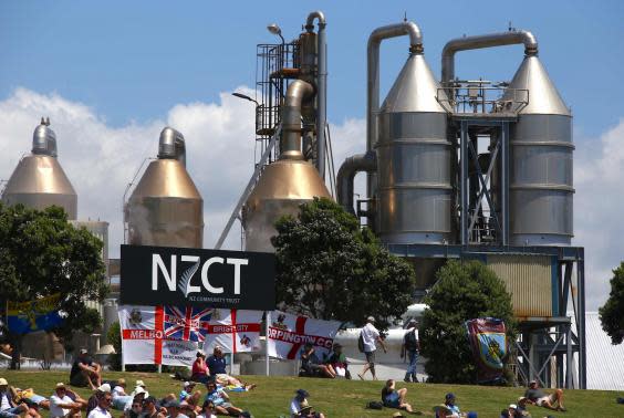 England fans watch on at Mount Maunganui (AFP via Getty Images)