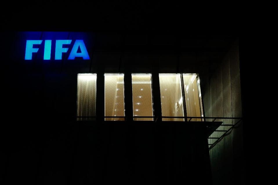 The decision to award Qatar football's highest-profile tournament ultimately sparked a wider fraud probe that led to the arrest of a series of senior FIFA figures (AFP Photo/FABRICE COFFRINI)