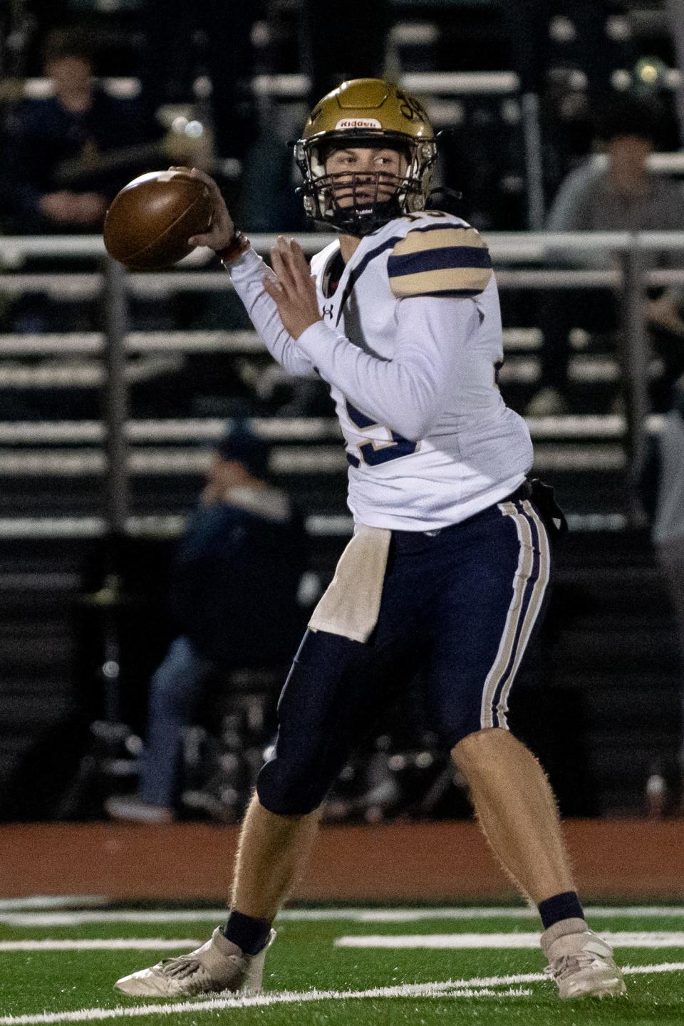 La Salle quarterback Tim Smith attempts a pass during Friday's game against Archbishop Wood.