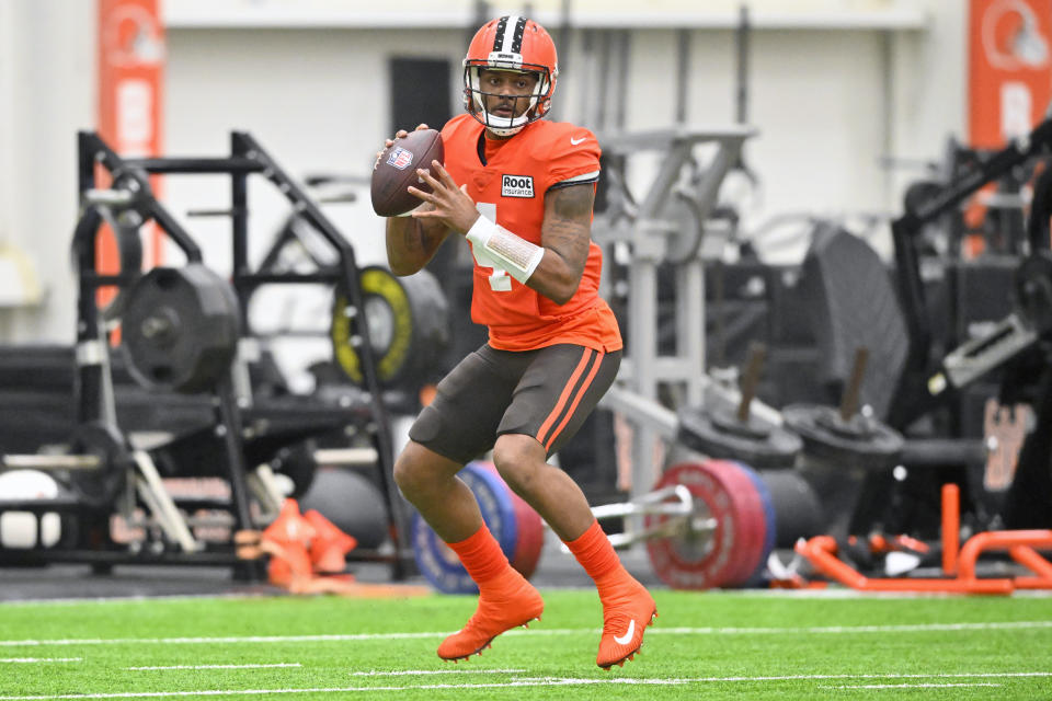 Cleveland Browns quarterback Deshaun Watson looks to pass during an NFL football practice at the team's training facility Wednesday, Nov. 30, 2022, in Berea, Ohio. (AP Photo/David Richard)