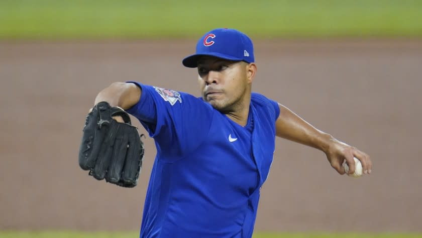 Chicago Cubs starting pitcher Jose Quintana delivers during the first inning of a baseball game.