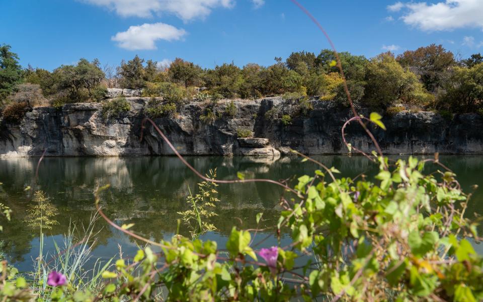 The San Gabriel River flows through Blue Hole Park in Georgetown. The popular park features a lagoon surrounded by limestone bluffs five blocks from downtown.