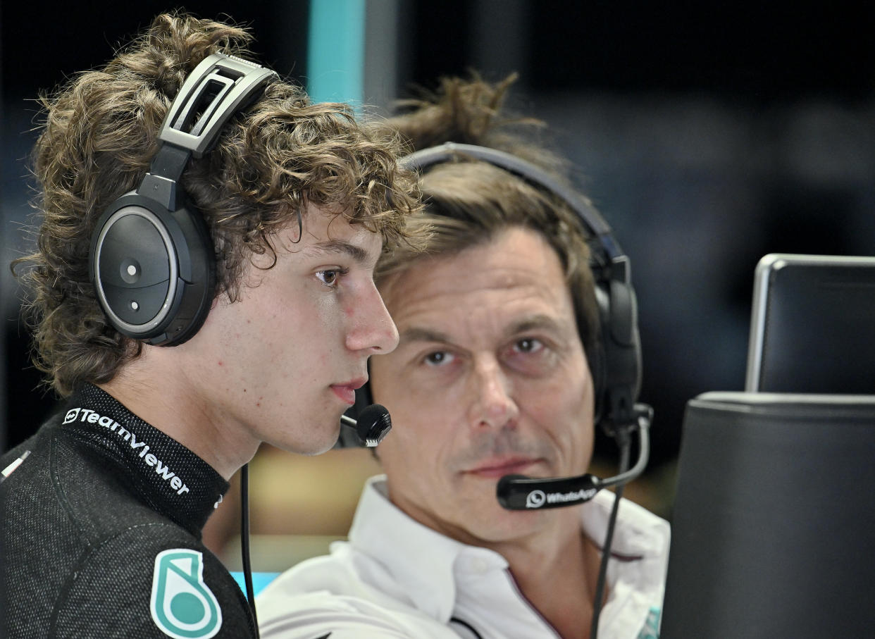 MONZA, ITALY - AUGUST 30: Andrea Kimi Antonelli of Italy and Mercedes-AMG PETRONAS F1 Team and Toto Wolff of Austria and Mercedes-AMG PETRONAS F1 Team in the garage during practice ahead of the F1 Grand Prix of Italy at Autodromo Nazionale Monza on August 30, 2024 in Monza, Italy. (Photo by Vince Mignott/MB Media/Getty Images)