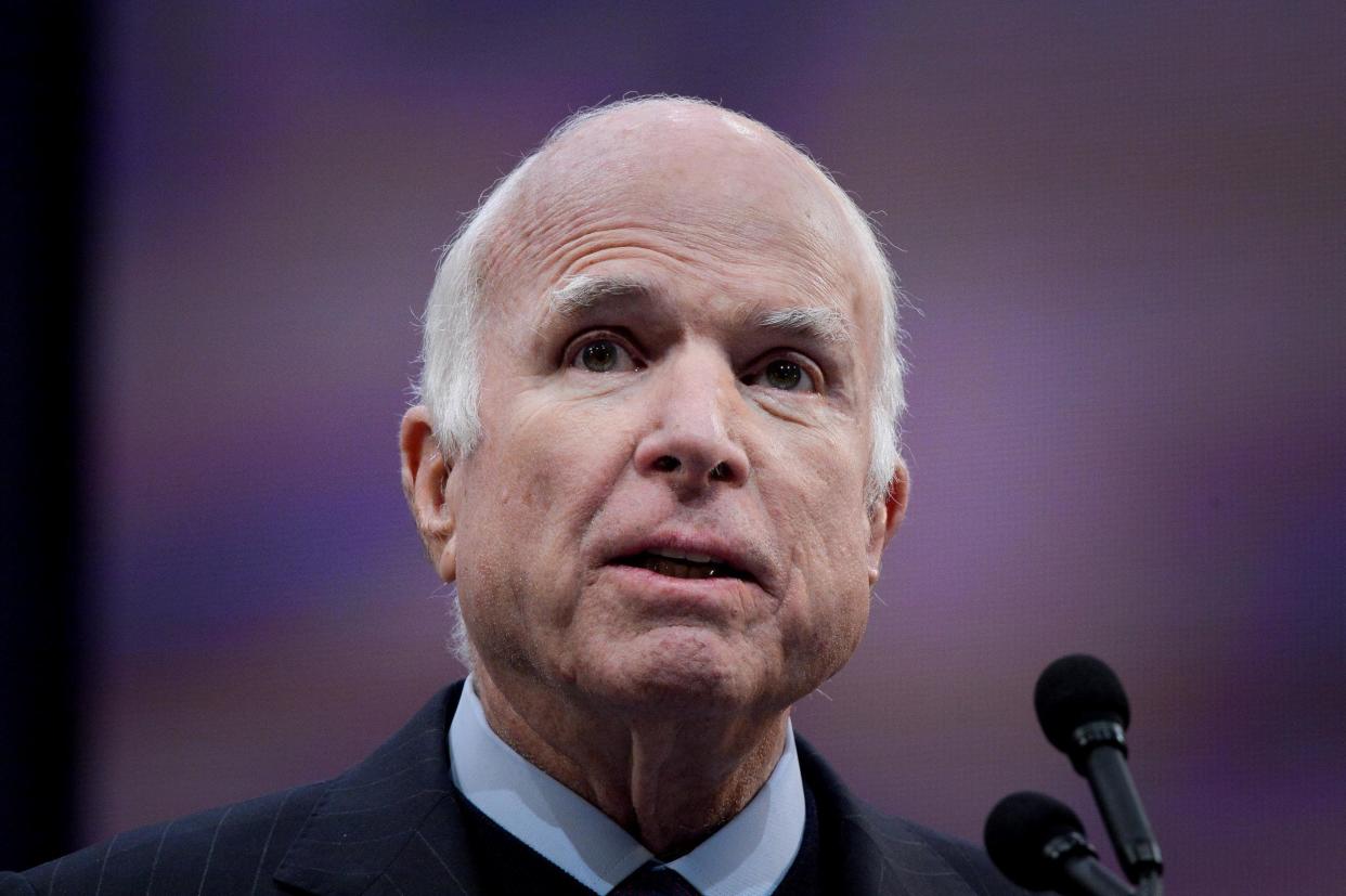 It is not the first time the senior Republicans have clashed over the Vietnam War, during which Mr McCain served as a naval aviator: REUTERS/Charles Mostoller