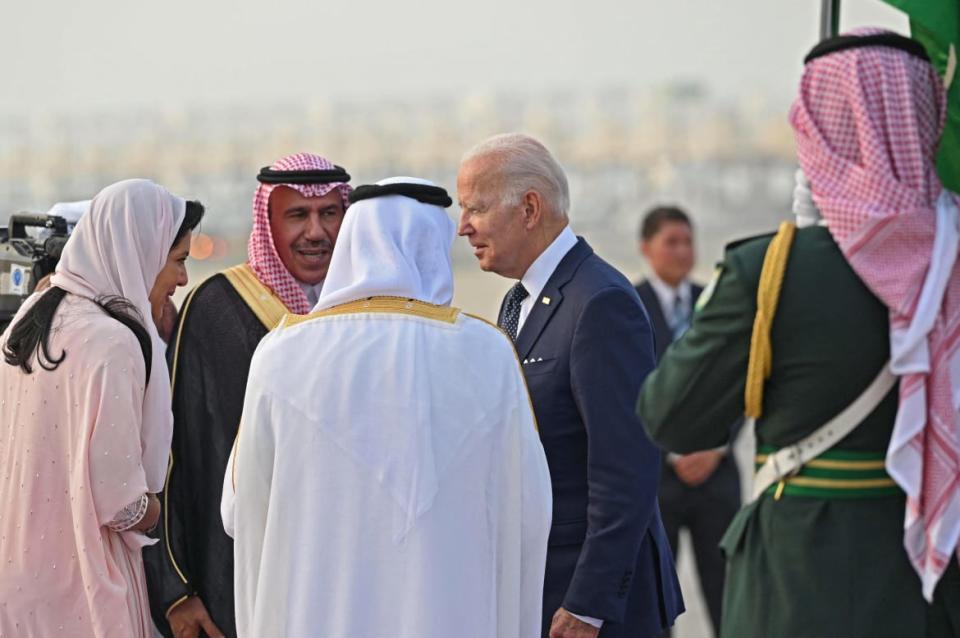 <div class="inline-image__caption"><p>President Joe Biden is welcomed by Mecca province governor Prince Khaled al-Faisal and Princess Reema bint Bandar Al-Saud, Saudi Arabia’s ambassador to Washington, at the King Abdulaziz International Airport in Jeddah.</p></div> <div class="inline-image__credit">Mandel Ngan/AFP via Getty</div>