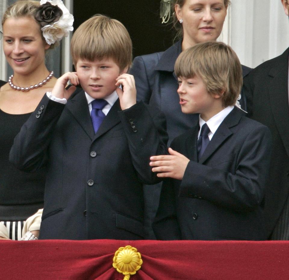 Columbus and Cassius Taylor stand on the balcony of Buckingham Palace during the Trooping the Colour parade in 2007 (Shutterstock)