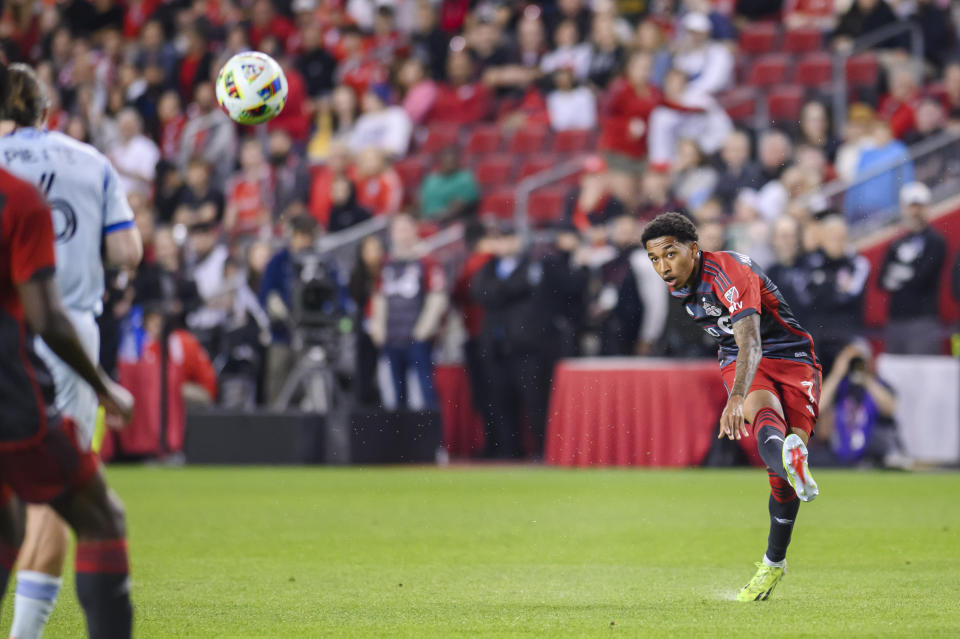 Toronto FC midfielder Jahkeele Marshall-Rutty (7) shoots against CF Montreal during the second half an MLS soccer game, Saturday, May 18, 2024 in Toronto. (Chris Katsarov/The Canadian Press via AP)