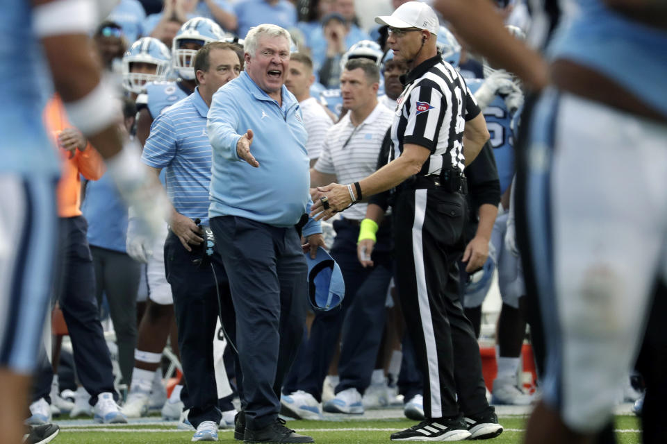 North Carolina head coach Mack Brown argues a call with an offical during the second half of an NCAA college football game against Notre Dame in Chapel Hill, N.C., Saturday, Sept. 24, 2022. (AP Photo/Chris Seward)