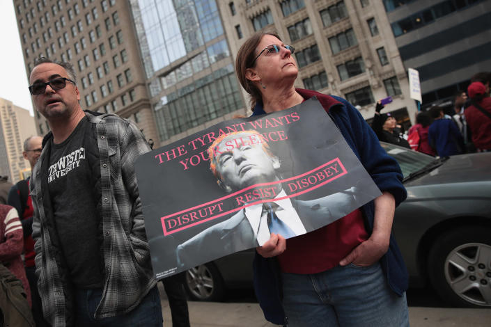 <p>Demonstrators stage a “Not my President’s Day” protest near Trump Tower in Chicago, Feb. 20, 2017. (Photo: Scott Olson/Getty Images) </p>