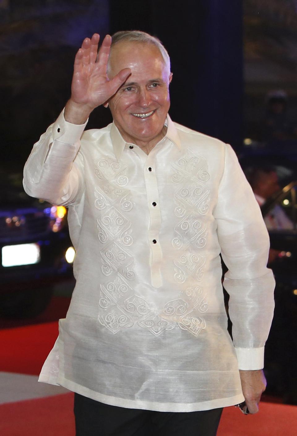 Australia's Prime Minister Malcolm Turnbull arrives in a traditional barong for a welcome dinner during the Asia-Pacific Economic Cooperation (APEC) summit in the capital city of Manila
