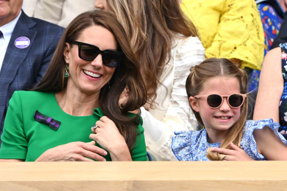 <p> Karwai Tang/WireImage</p> Kate Middleton and Princess Charlotte watch the the Wimbledon Tennis Championship on July 16, 2023