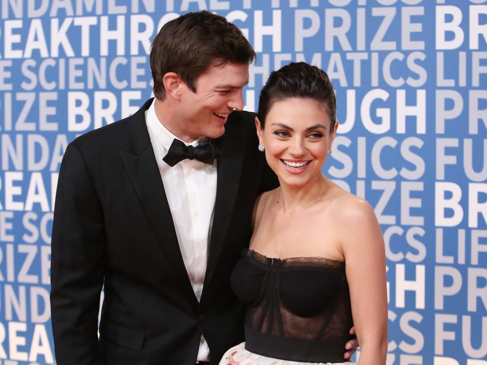 Actors Ashton Kutcher (L) and Mila Kunis attend the 2018 Breakthrough Prize at NASA Ames Research Center on December 3, 2017 in Mountain View, California.