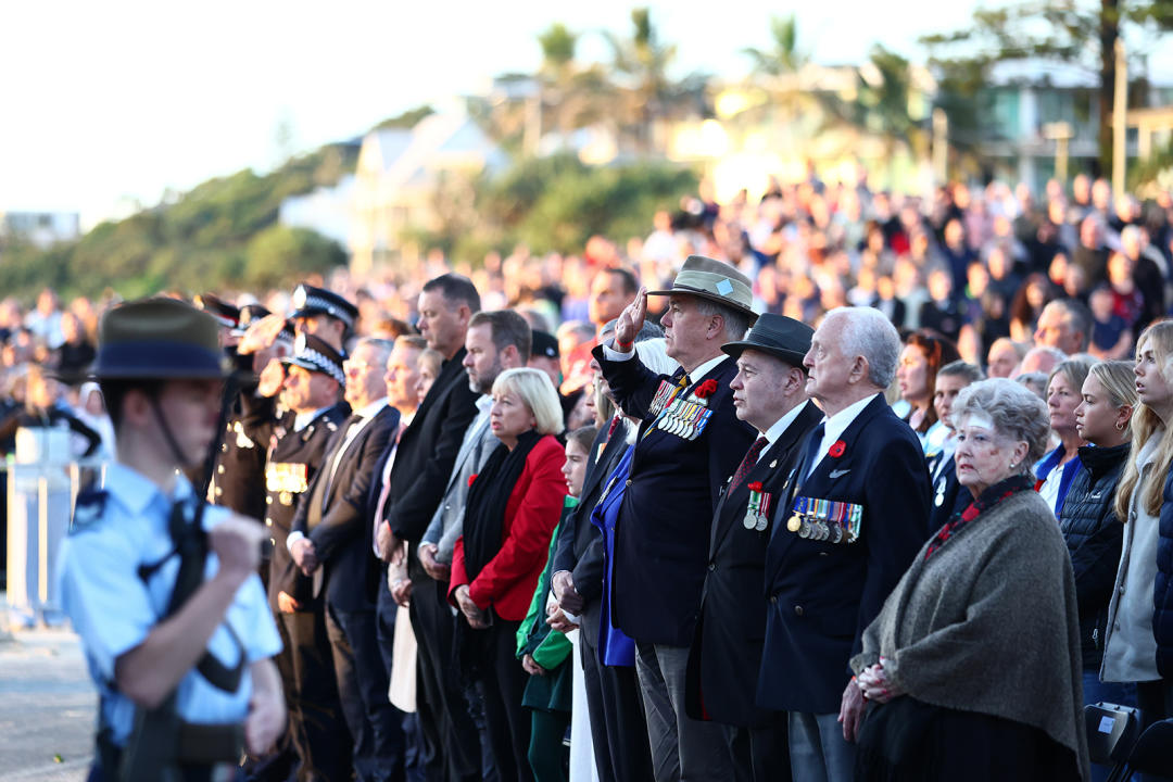  Crowds take part in the Anzac Day dawn service in Currumbin on the Gold Coast. Source: Getty