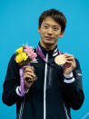 LONDON, ENGLAND - JULY 30: Bronze medalist Ryosuke Irie of Japan celebrates with his medal during the medal ceremony for the Men's 100m Backstroke on Day 3 of the London 2012 Olympic Games at the Aquatics Centre on July 30, 2012 in London, England. (Photo by Adam Pretty/Getty Images)