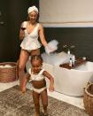 <p>Tia Mowry and her daughter Cairo enjoyed some self care in matching white Marysia suits in May 2020.</p>