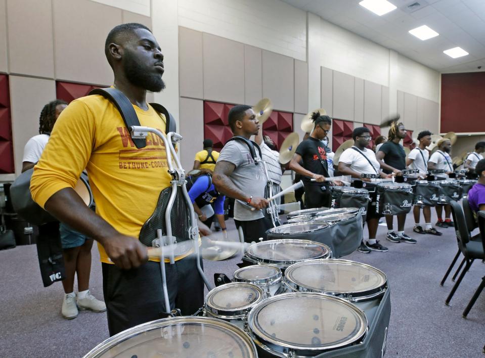 Members of the Bethune-Cookman University Marching Wildcats practice Tuesday, Aug. 30, 2022. The students showcased their talents with seven other historically Black colleges and universities last month.