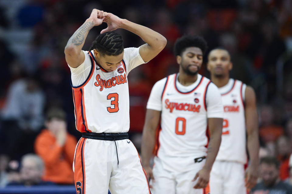 Syracuse guard Judah Mintz (3) reacts during the second half of the team's NCAA college basketball game against Florida State in Syracuse, N.Y., Tuesday, Jan. 23, 2024. (AP Photo/Adrian Kraus)