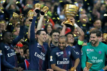 Soccer Football - AS Monaco v Paris Saint Germain - French Ligue cup final - Stade de Lyon - Decines, France - 1/4/2017 - Players of Paris Saint Germain hold up the trophy after defeating AS Monaco . REUTERS/Robert Pratta