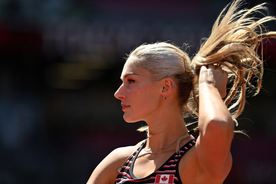 <p>Canada's Georgia Ellenwood competes in the women's heptathlon javelin throw during the Tokyo 2020 Olympic Games at the Olympic Stadium in Tokyo on August 5, 2021. (Photo by Andrej ISAKOVIC / AFP)</p> 