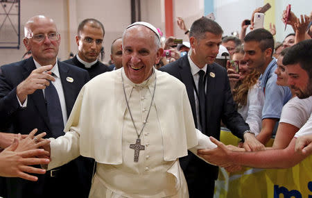 Pope Francis meets people in a youth centre dedicated to Pope John Paul II during his visit to Sarajevo June 6, 2015. REUTERS/Dado Ruvic/File Photo