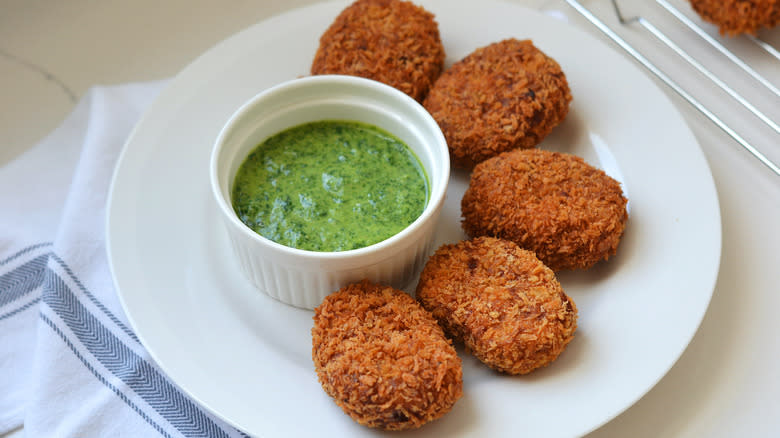 lentil croquettes with green dipping sauce