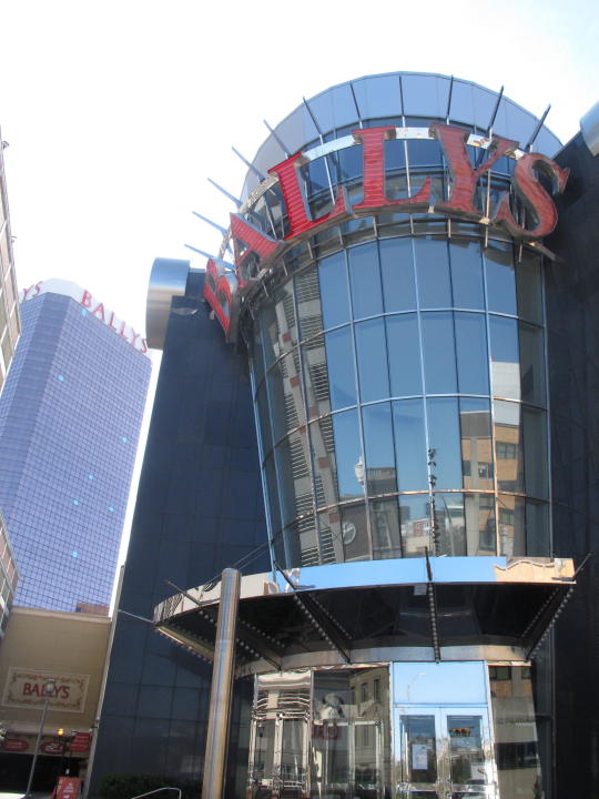 This Oct. 1, 2020, photo shows the exterior of Bally's casino in Atlantic City, N.J. The online sports betting company FanDuel will open an in-person sports book at Bally's casino in Atlantic City once the casino's sale to a Rhode Island company is finalized. FanDuel told The Associated Press on Wednesday, Oct. 28, 2020, that it has plans for a temporary sports betting facility in the casino before the end of the year, and will build a permanent sports book on the center of the casino floor next spring. (AP Photo/Wayne Parry)