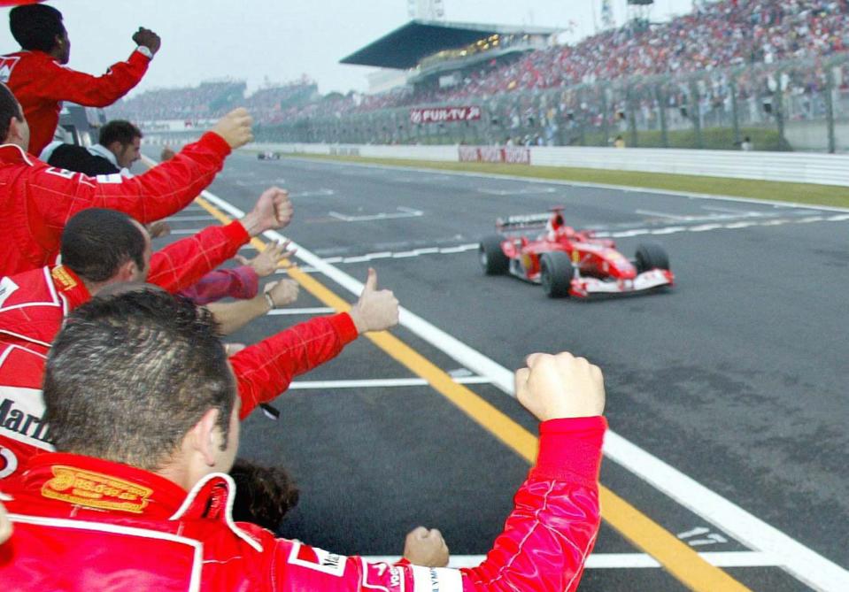 SUZUKA, JAPAN - OCTOBER 12: GP von Japan 2003, Suzuka; Michael SCHUMACHER/Ferrari faehrt ueber die Ziellinie (Photo by Alexander Hassenstein/Bongarts/Getty Images)